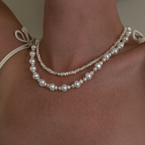 שרשרת פנינים סימון